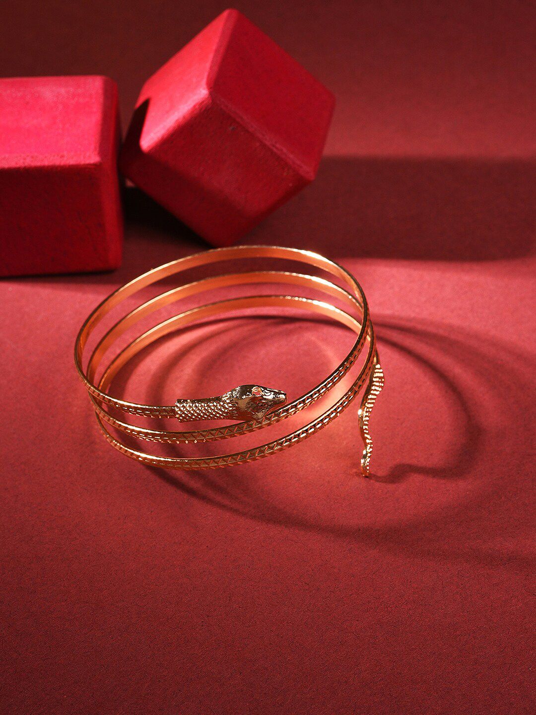 SOHI Women Gold-Toned Gold-Plated Bangle-Style Bracelet Price in India
