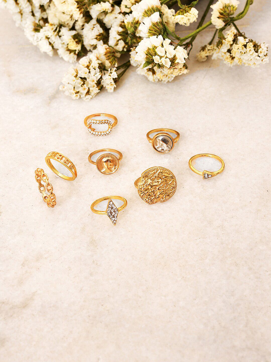 SOHI Pack of 8 Gold Plated Designer Stone Rings Price in India