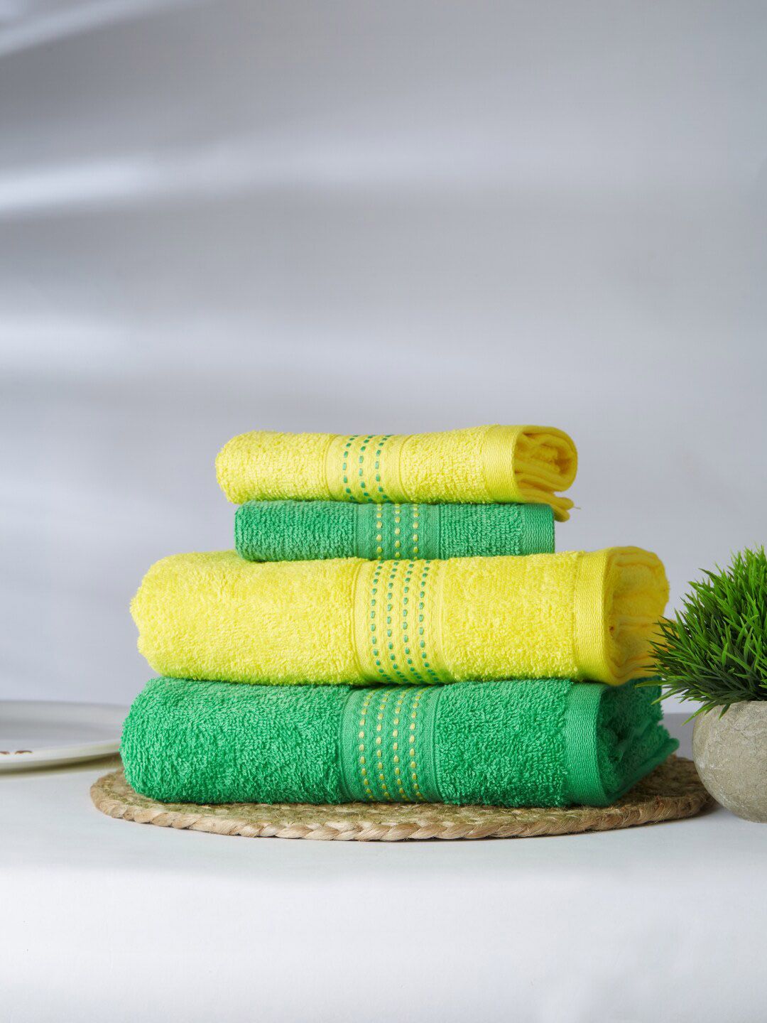 SPACES Set Of 4 Green & Yellow Solid Cotton 380 GSM Towel Set Price in India