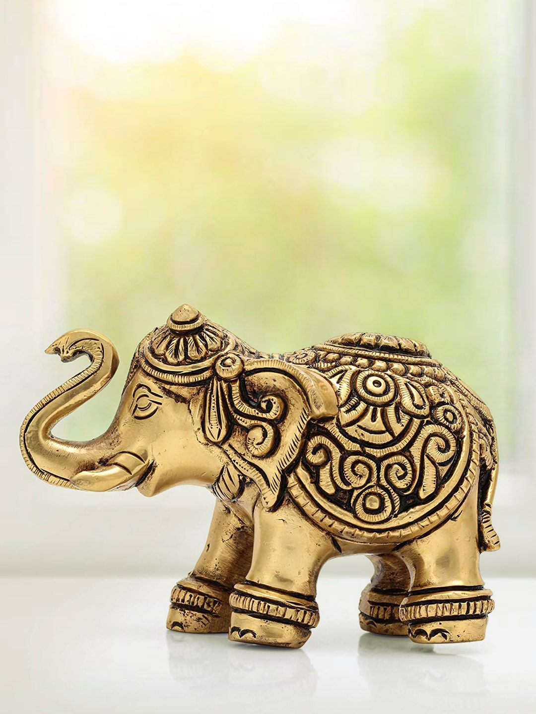 CraftVatika Gold-Toned Elephant Trunk Up Showpiece Price in India