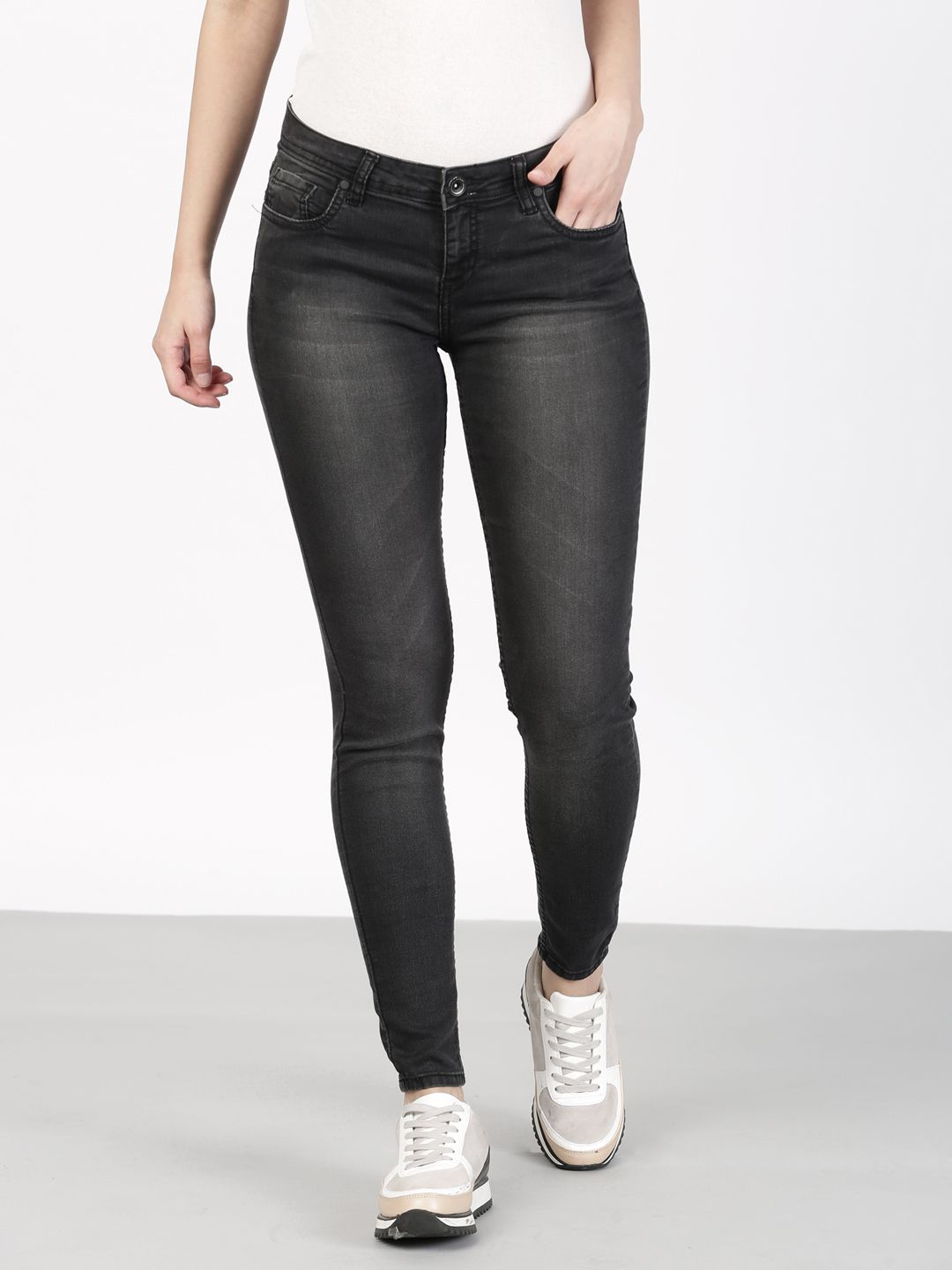 ether Women Black Skinny Fit Mid-Rise Clean Look Stretchable Jeans Price in India