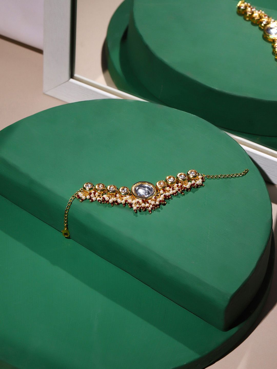 Ruby Raang Women Gold-Toned & White Brass Kundan Gold-Plated Wraparound Bracelet Price in India