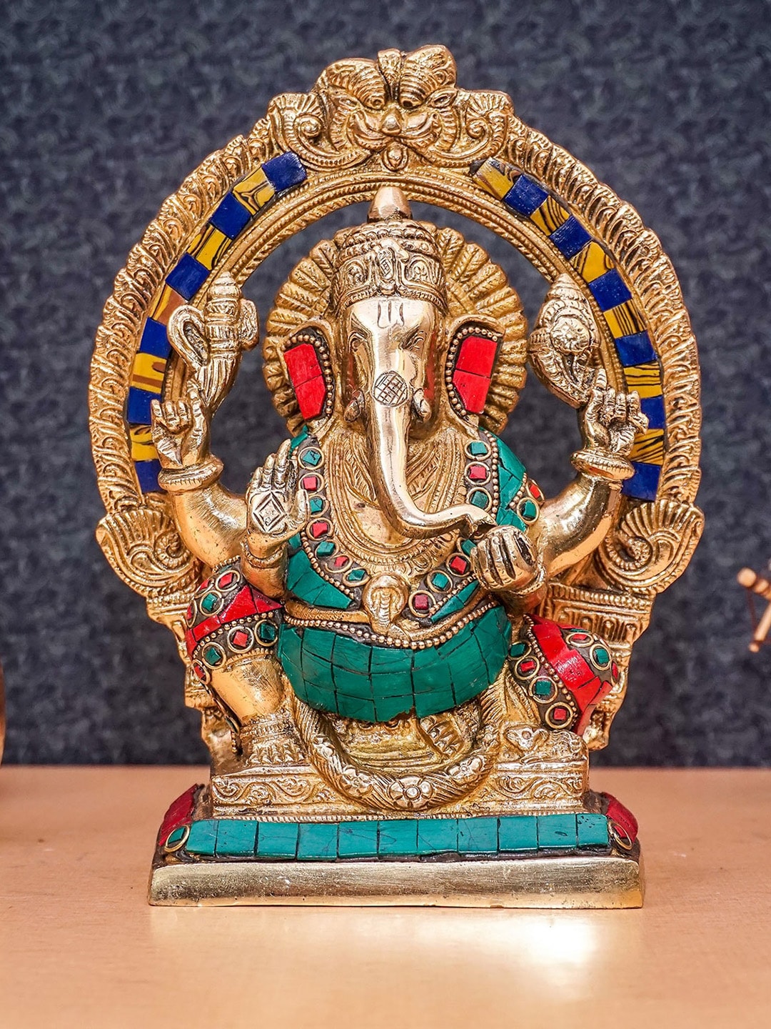 StatueStudio Gold-Toned & Green Antique Ganesha Sitting Showpiece Price in India