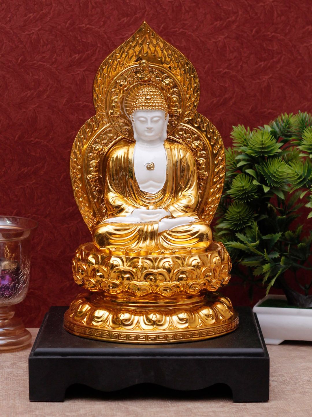 StatueStudio Gold-Tonned & White Leaf Buddha Idol Showpiece Price in India
