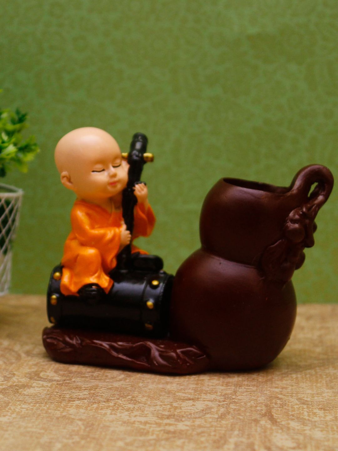 StatueStudio Orange & Purple Textured Baby Buddha Monk Showpiece Price in India