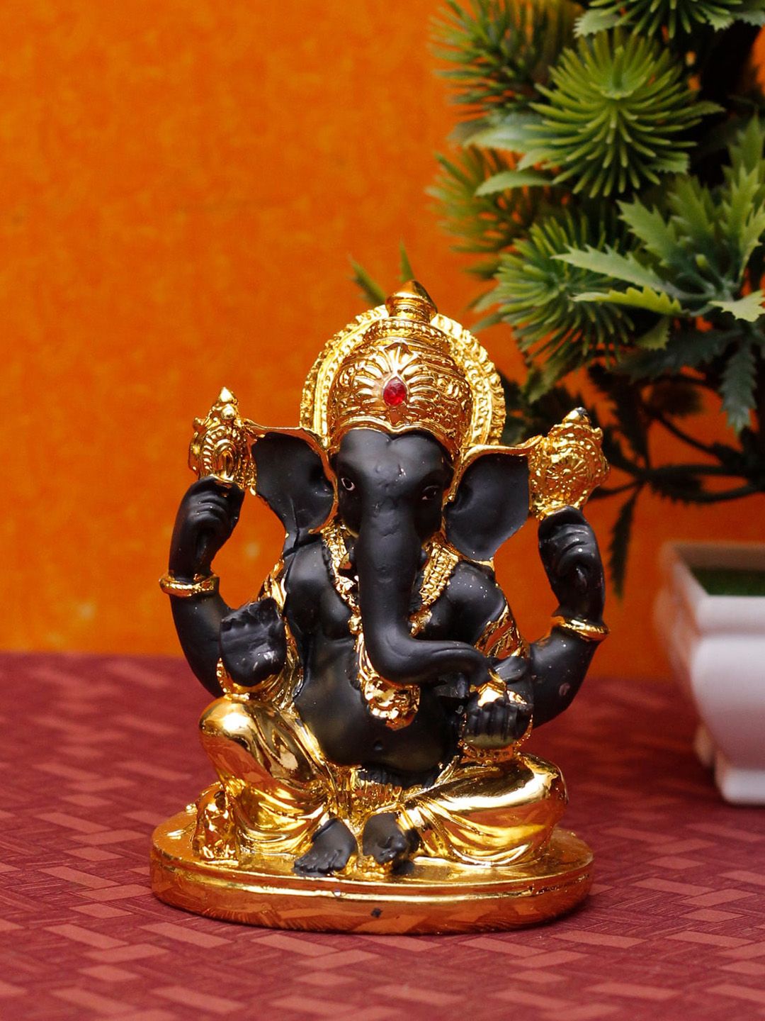 StatueStudio Gold & Black Polyresin Ganpati Statue Showpiece Price in India
