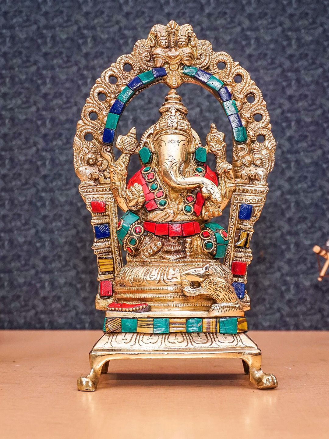 StatueStudio Gold-Toned & Green Ganpati Sitting Showpiece Price in India