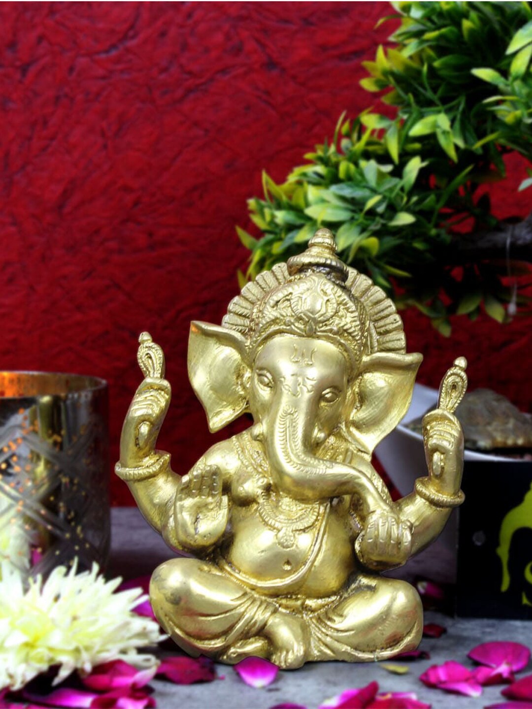 StatueStudio Gold Toned Ganesha Showpiece Price in India