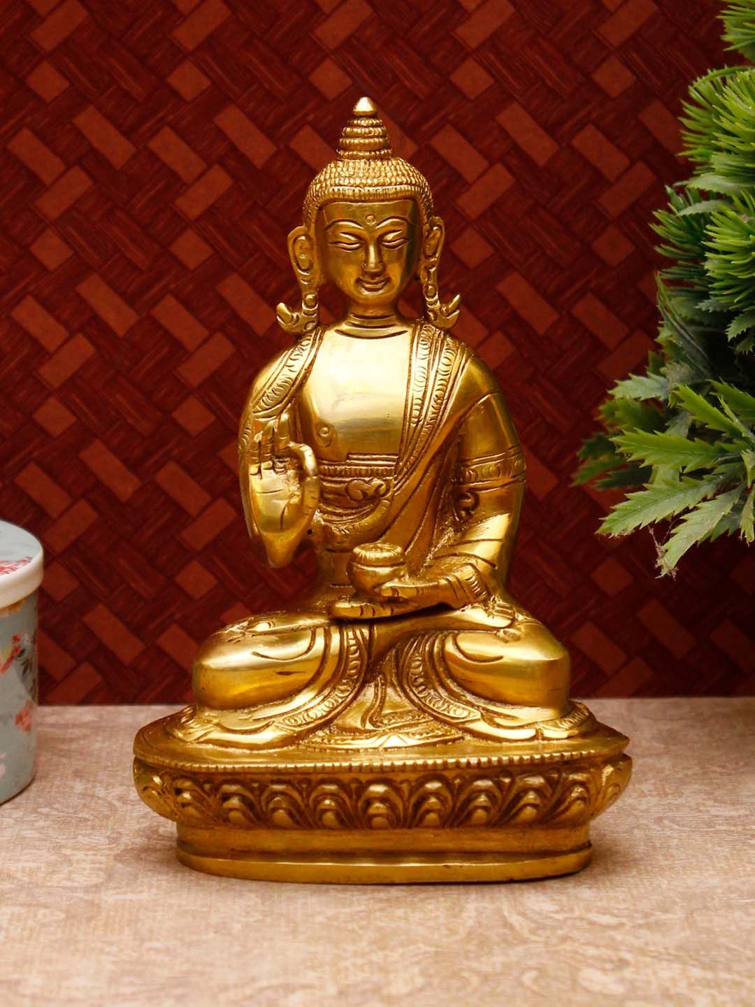 StatueStudio Gold-Toned Antique Buddha Sitting Showpieces Price in India