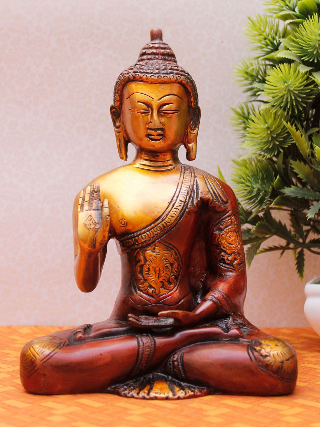 StatueStudio Copper Toned Buddha Idol Showpiece Price in India