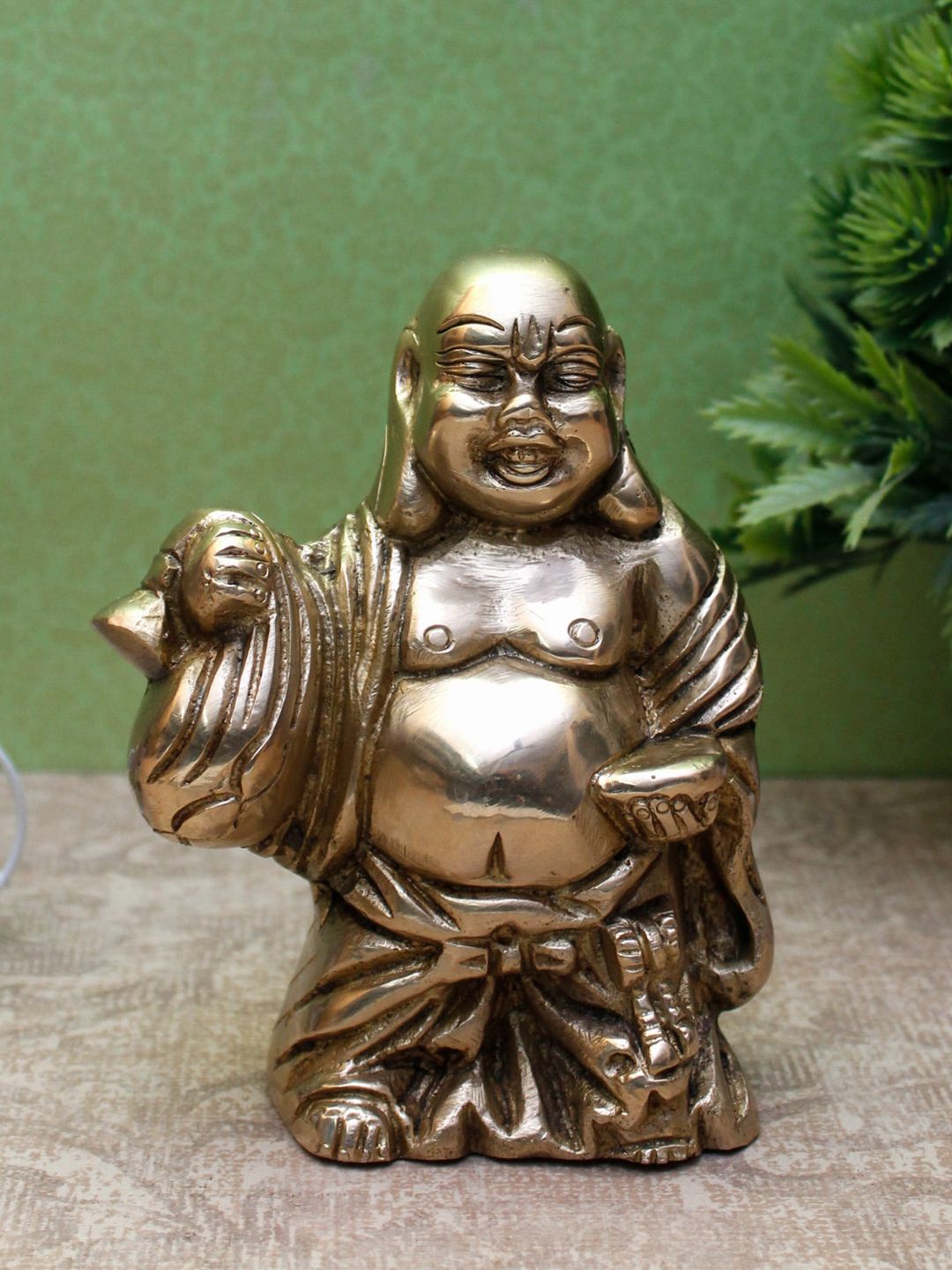 StatueStudio Gold-Toned Buddha Idol Figurine Showpiece Price in India