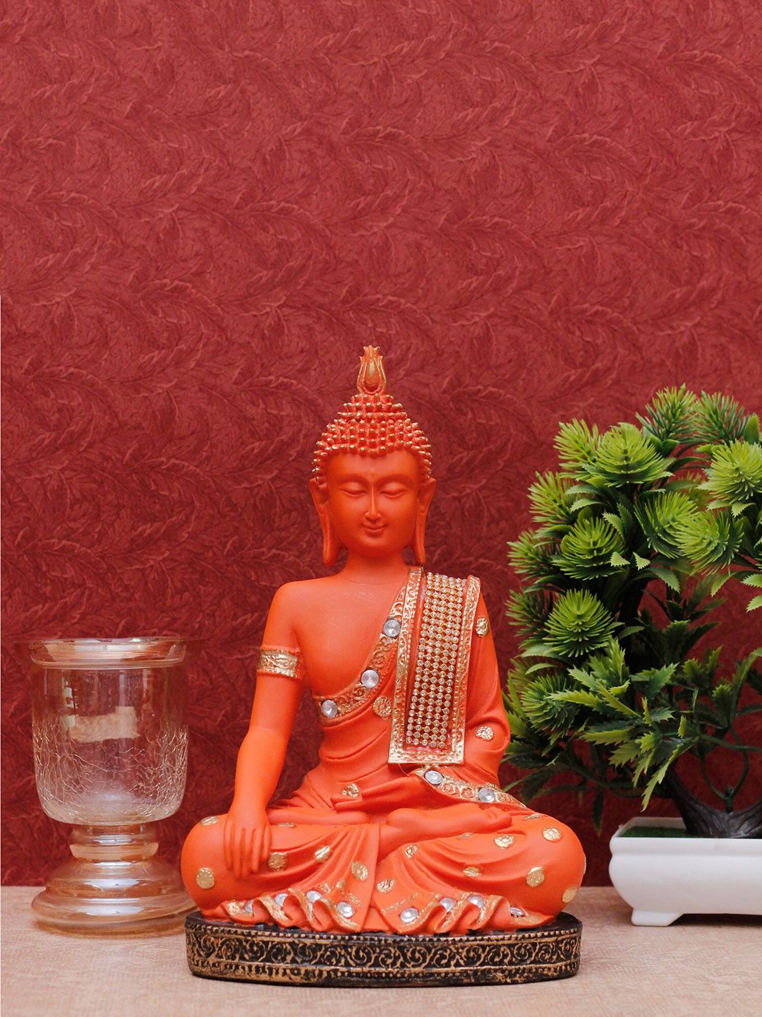 StatueStudio Orange Buddhist Showpiece Price in India