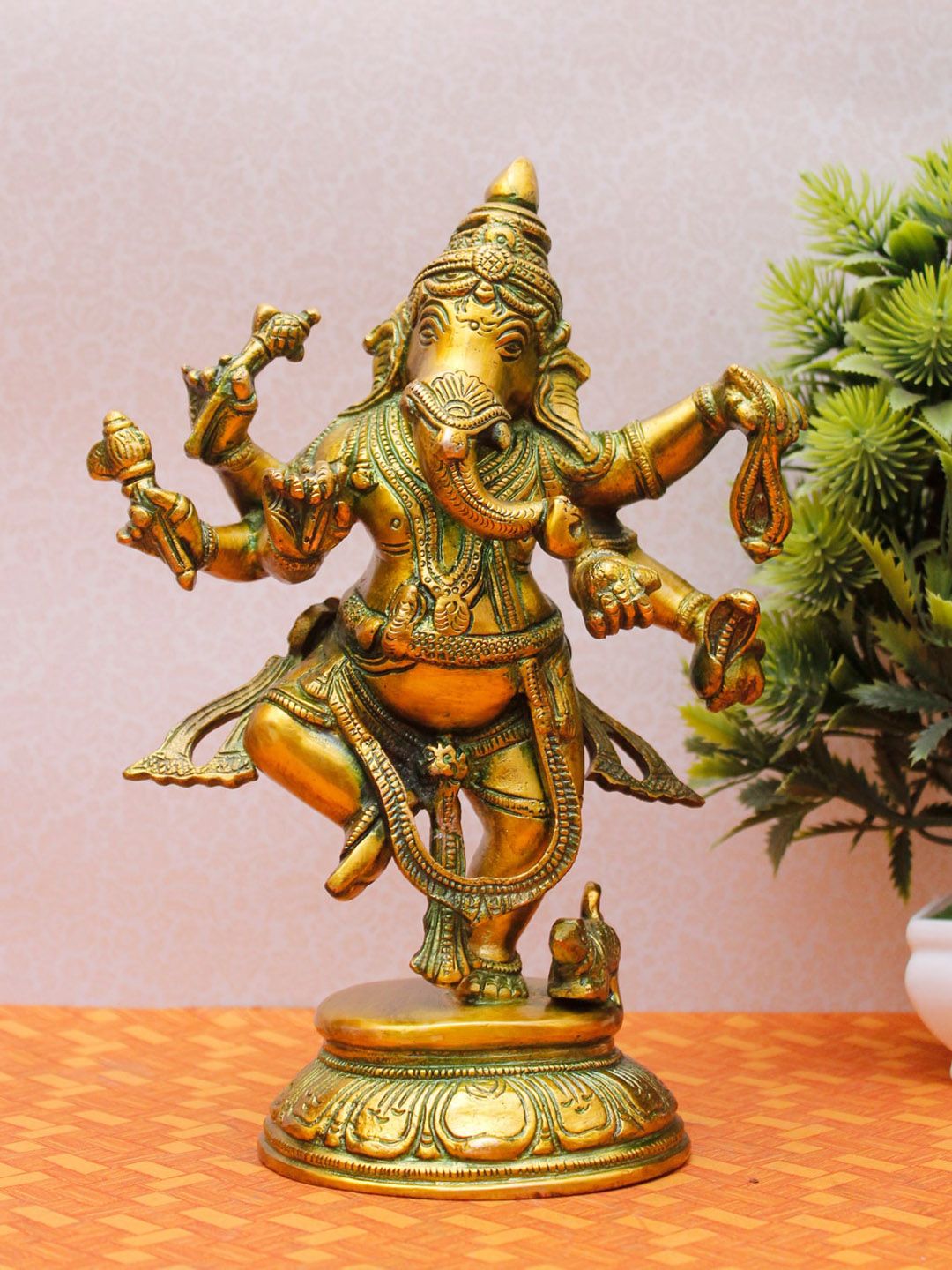 StatueStudio Green & Gold Dancing Ganpati Idol Showpiece Price in India
