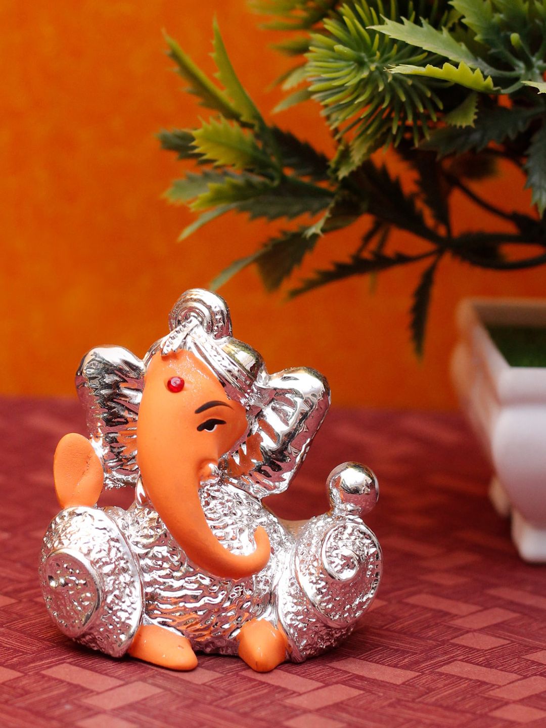 StatueStudio Silver-Toned  & Orange Ganesha  Showpiece Price in India
