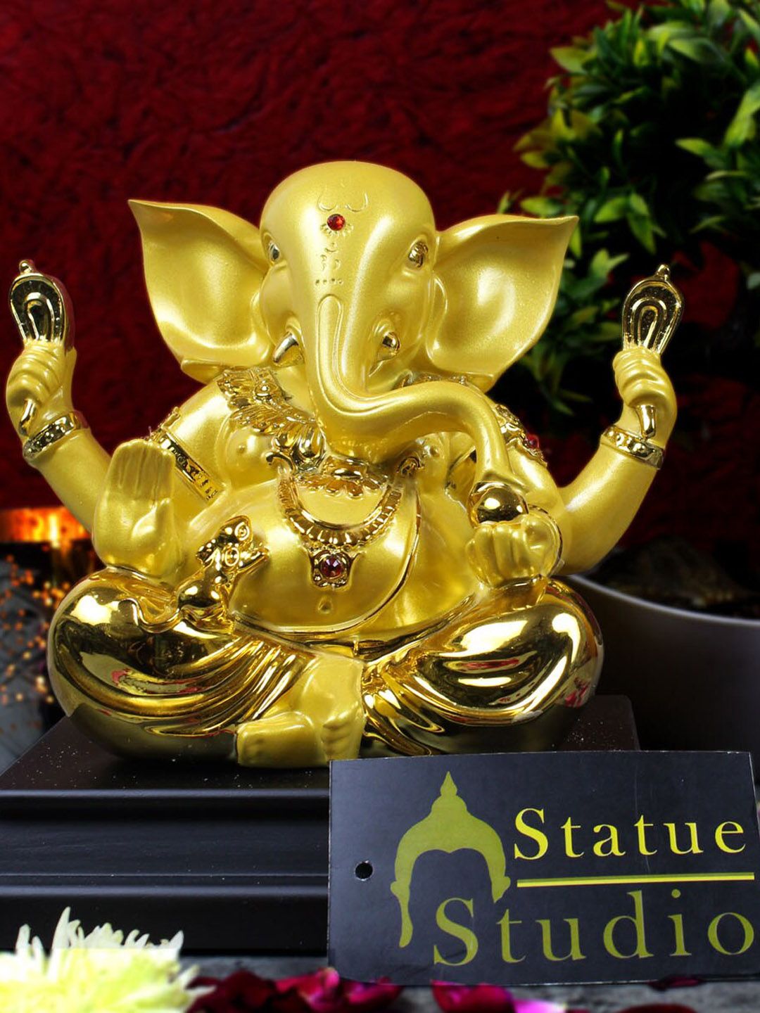 StatueStudio Yellow & Gold-Toned Ganpati Showpiece Price in India