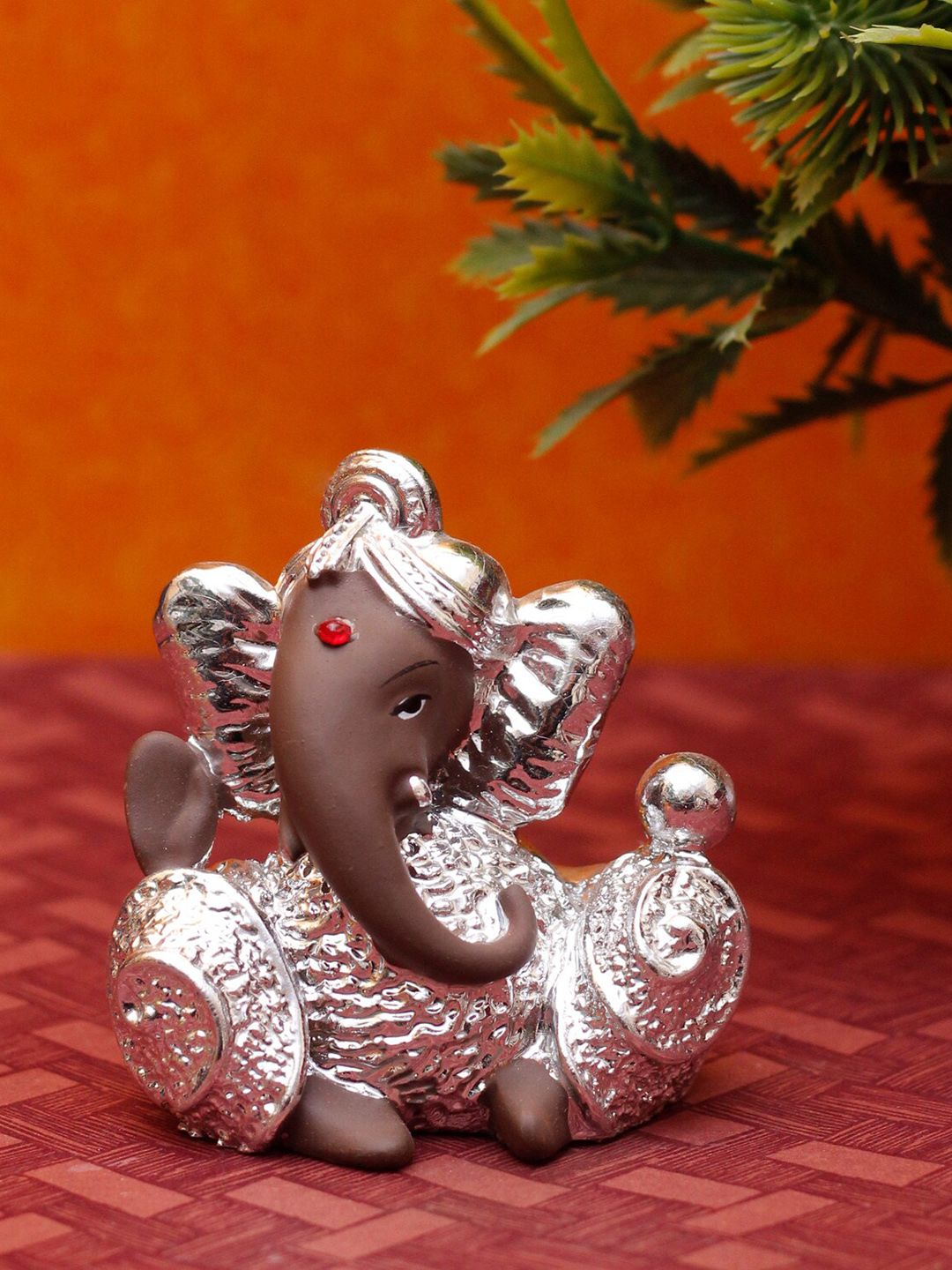 StatueStudio Silver-Toned & Brown Polyresin Ganpati Showpiece Price in India