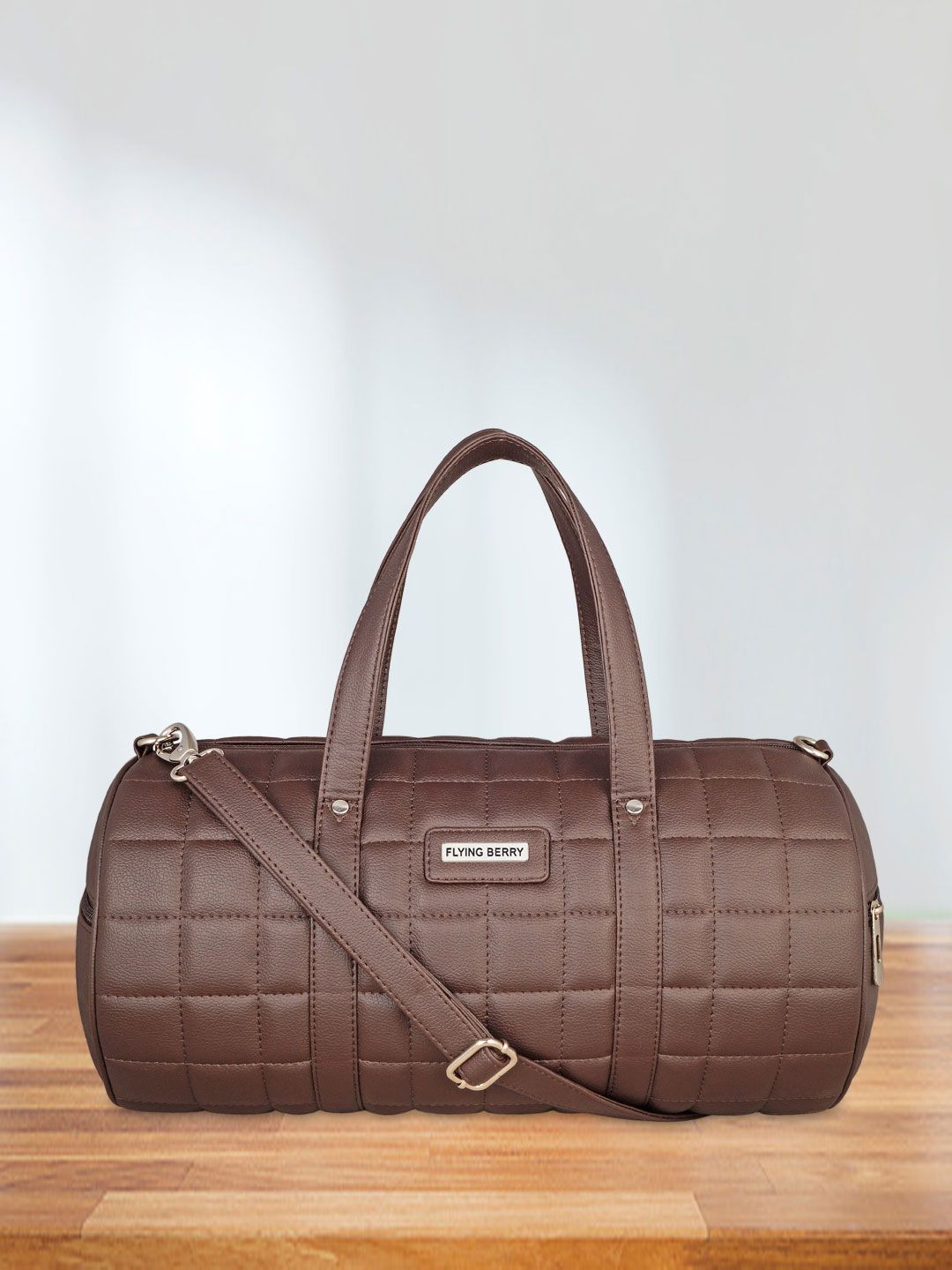 FLYING BERRY Brown Textured Duffel Bag Price in India