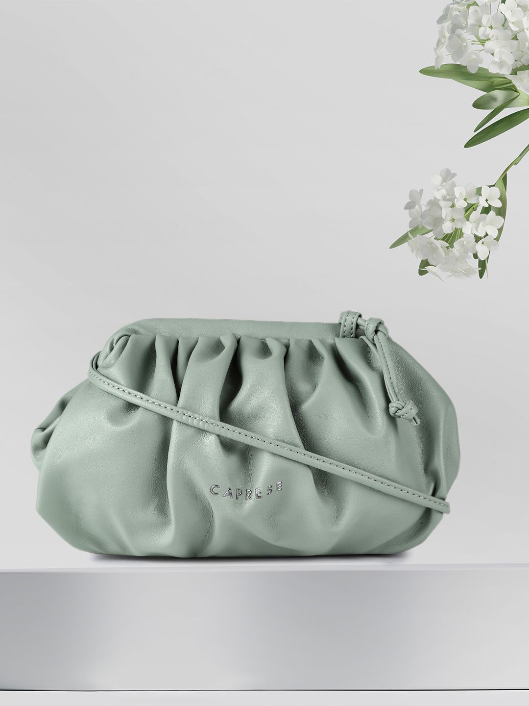 Caprese Women Sage Green Structured Sling Bag Price in India