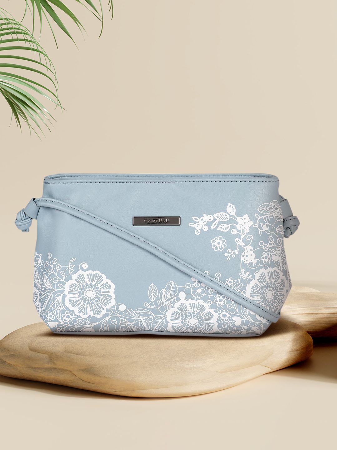 Caprese Blue Floral Printed Structured Sling Bag Price in India