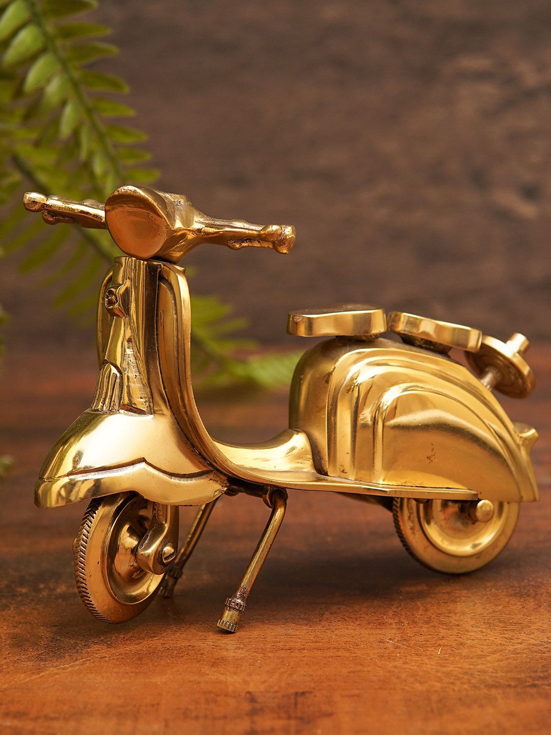 StatueStudio Gold-Toned Mini Scooter Showpiece Price in India
