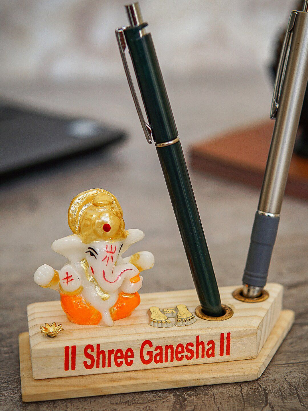 StatueStudio White & Orange Ganesha Statue With Pen Holder Showpiece Price in India