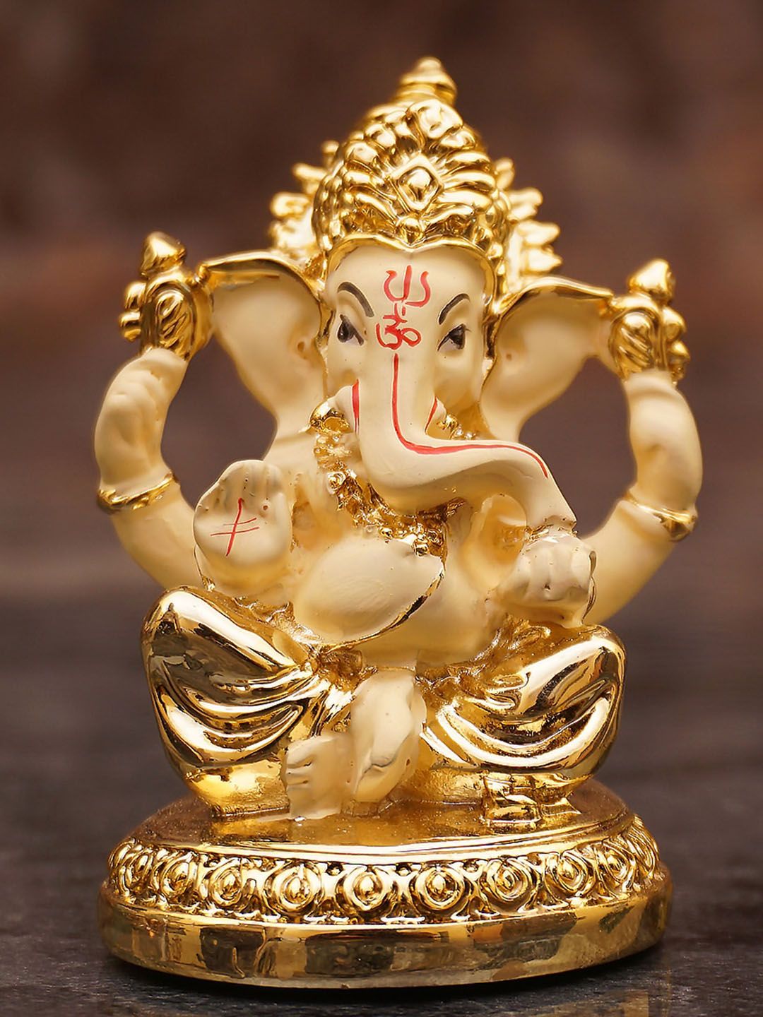 StatueStudio Cream-Toned & Gold-Toned Ganesha Mini Showpiece Price in India