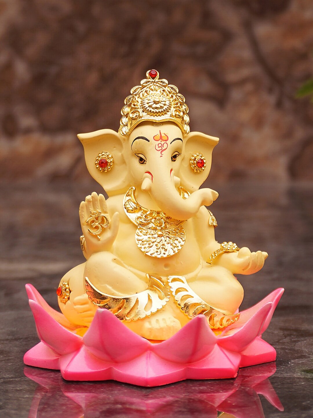 StatueStudio Gold Colored & Pink Ganesha Lotus Sitting Showpiece Price in India