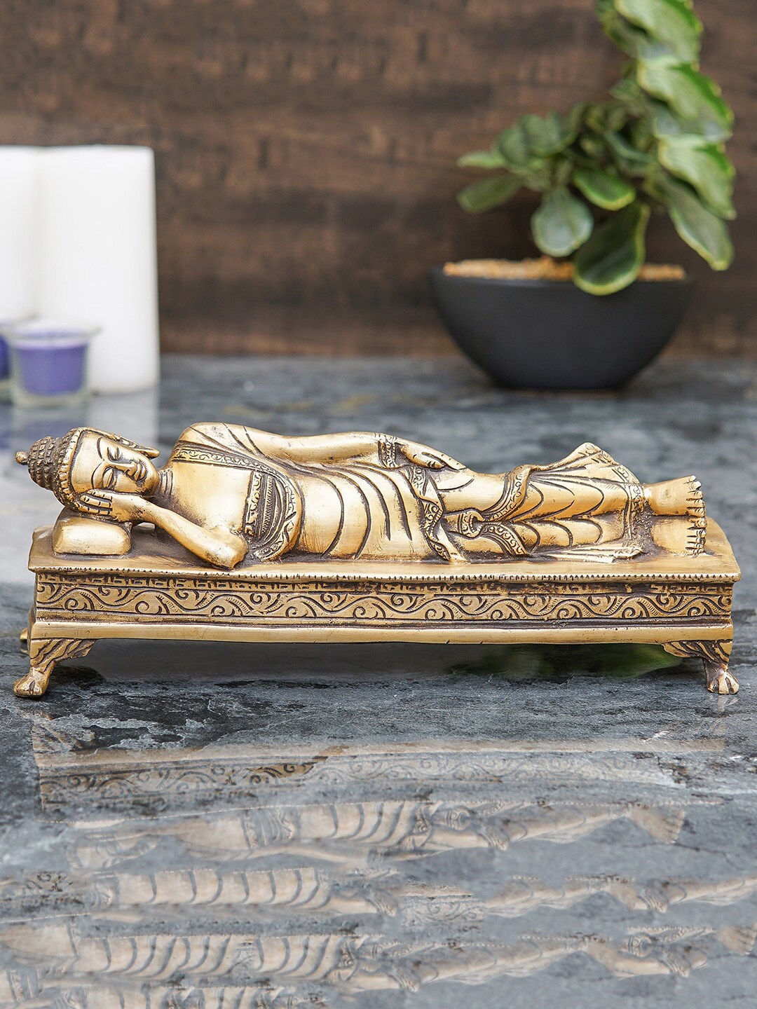 StatueStudio Bronze-Toned Sleeping Buddha Showpiece Price in India