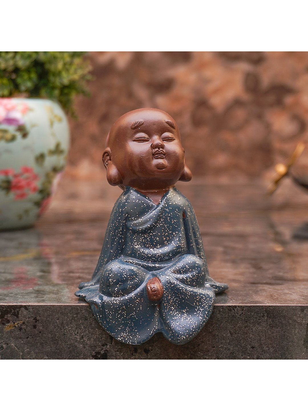 StatueStudio Blue & Brown Buddha Monk Idol Showpiece Price in India