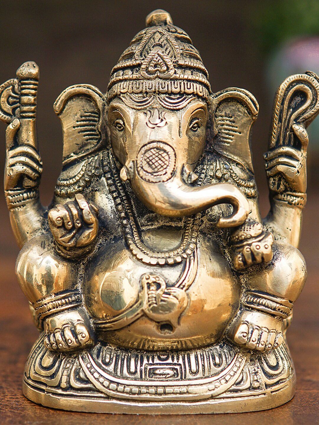 StatueStudio Gold-Toned Ganesha Statue Showpiece Price in India