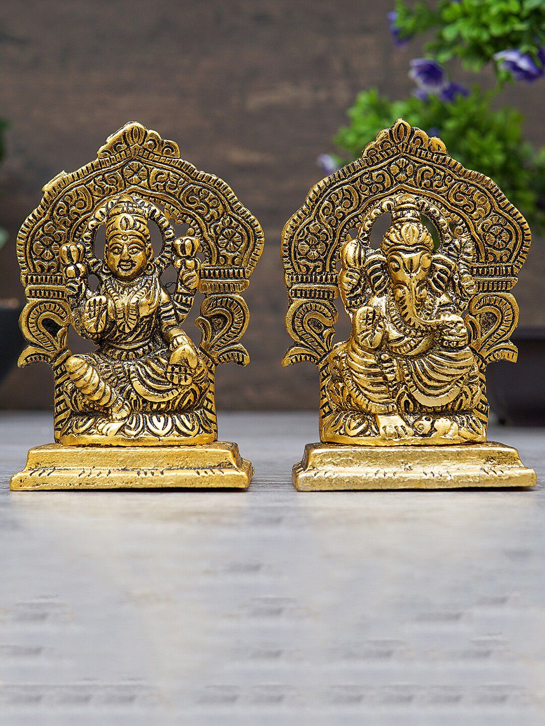 StatueStudio Gold Toned Ganesha Lakshmi Idol Showpiece Price in India