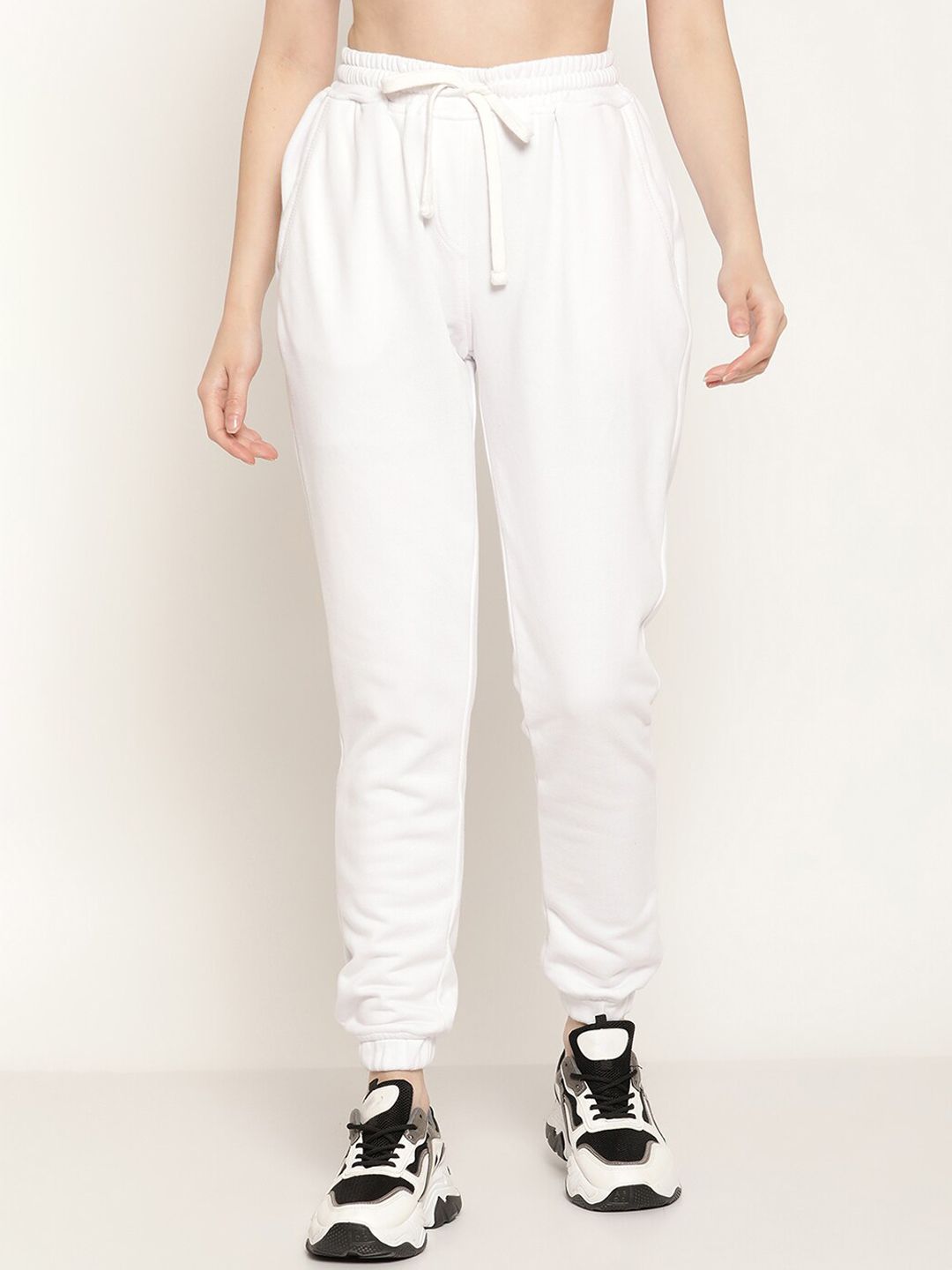 Rute Women White Solid Cotton Jogger Price in India