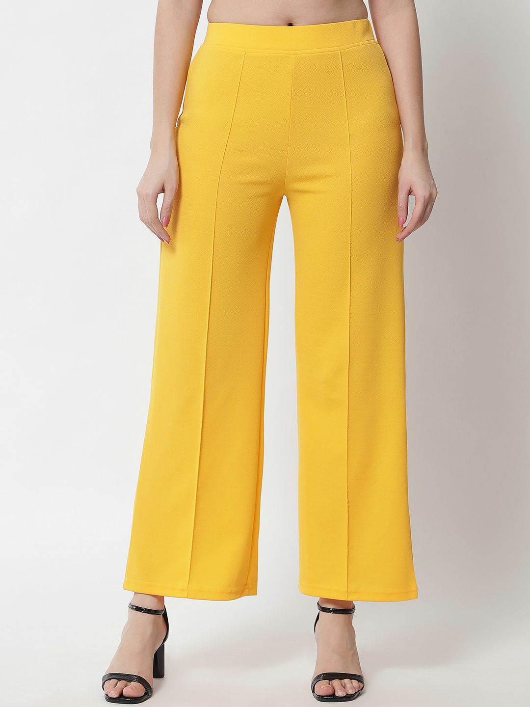 Kotty Women Yellow Solid Relaxed Straight Fit Easy Wash Pleated Trousers Price in India