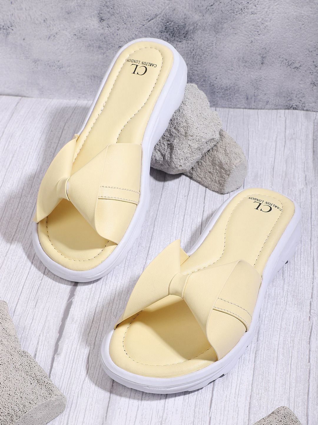 Carlton London sports Women Yellow & White Solid Sliders Price in India