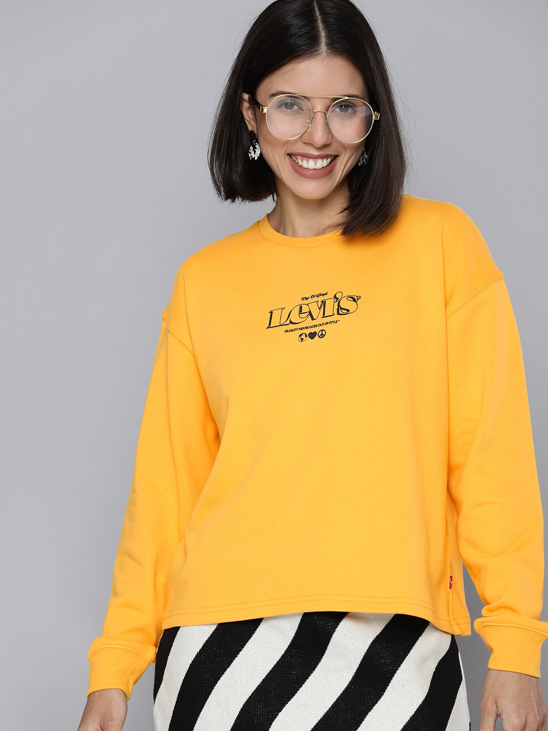 Levis Women Yellow Printed Drop-Shoulder Sweatshirt Price in India