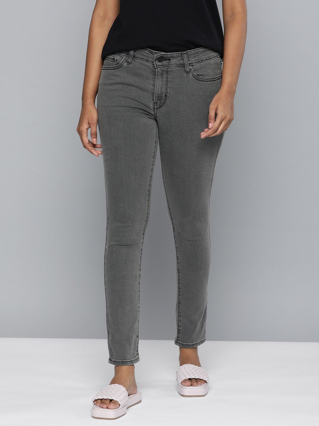 Levis Women Grey 711 Skinny Fit Mid-Rise Light Fade Stretchable Jeans Price in India