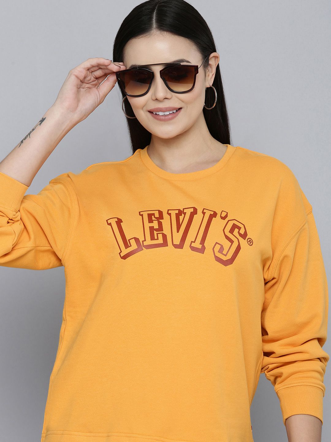 Levis Women Mustard Brand Logo Printed Pure Cotton Pullover Sweatshirt Price in India