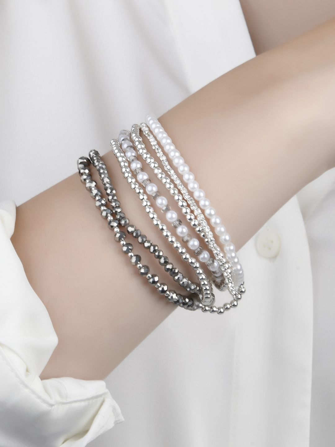 Lilly & sparkle Women Set Of 7 Silver-Plated Stretchable Bracelets Price in India