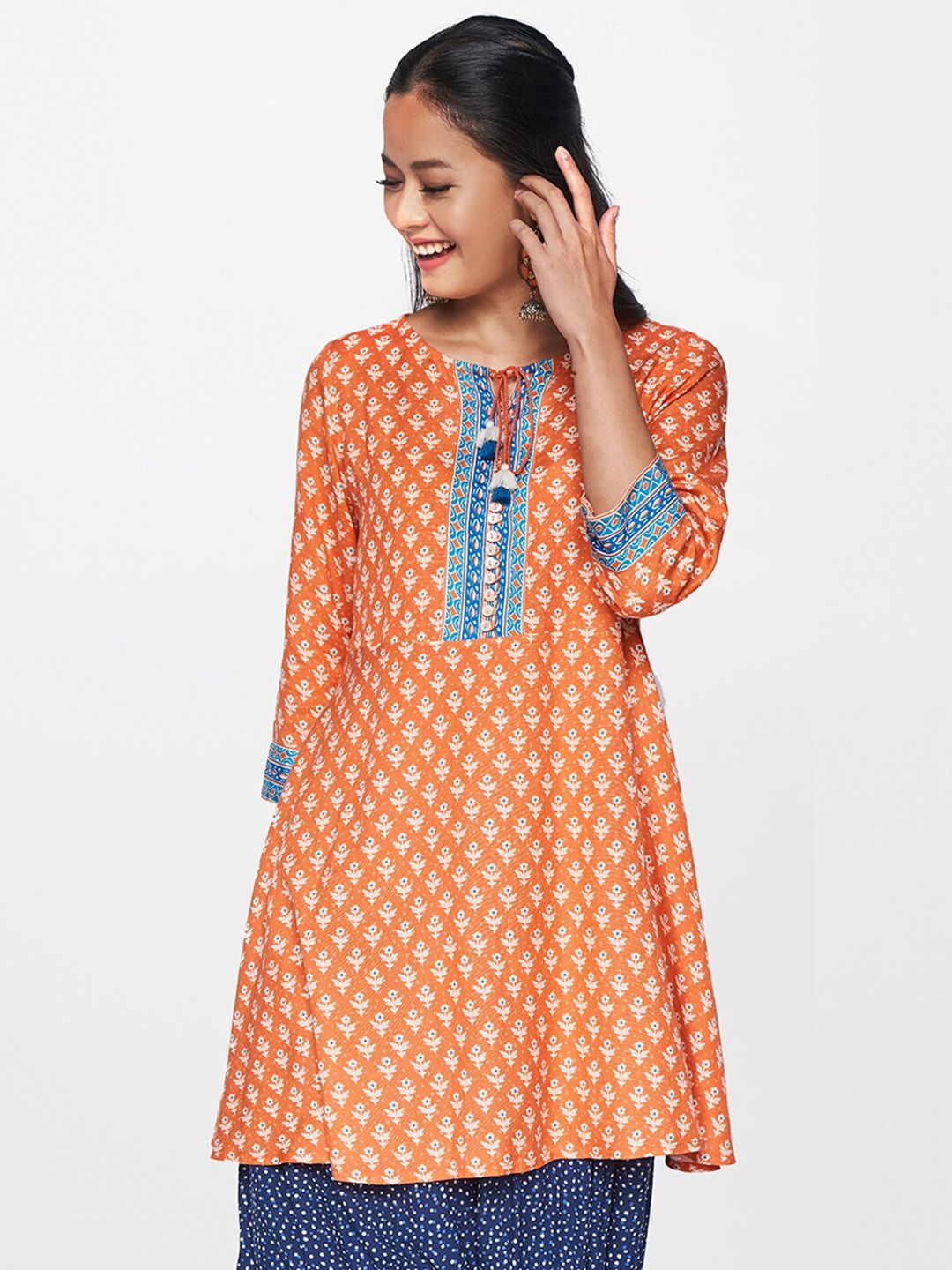 Global Desi Orange & White Printed Tunic Price in India