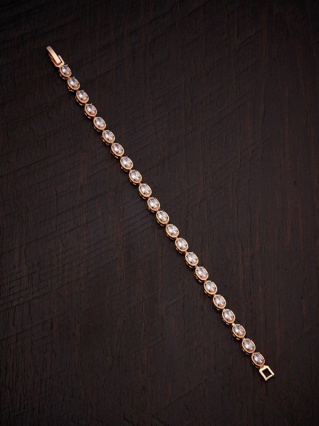 Kushal's Fashion Jewellery Women Gold-Plated & White Cubic Zirconia Wraparound Bracelet Price in India