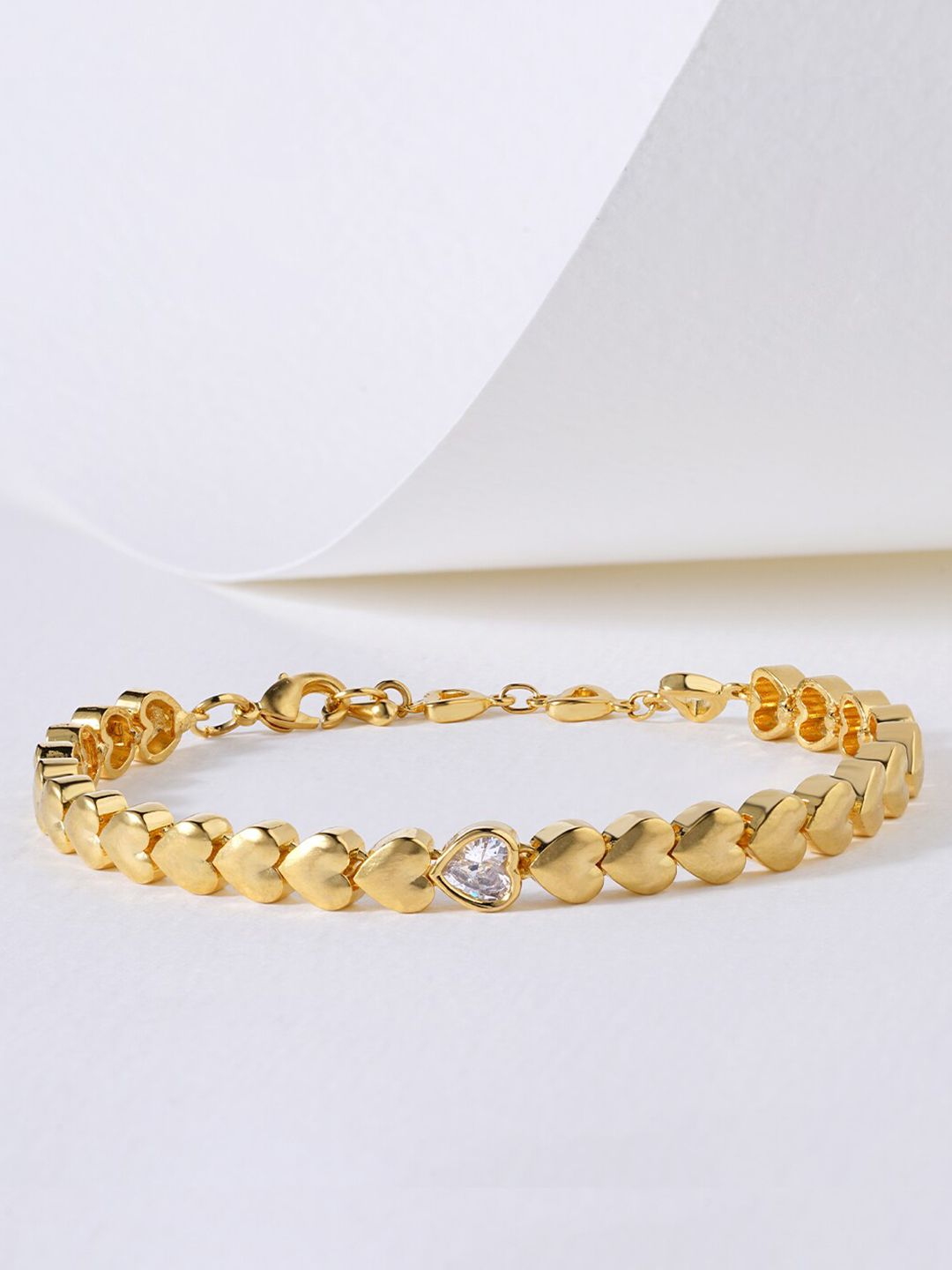 MINUTIAE Women Gold-Toned Brass Crystals Handcrafted Gold-Plated Link Bracelet Price in India