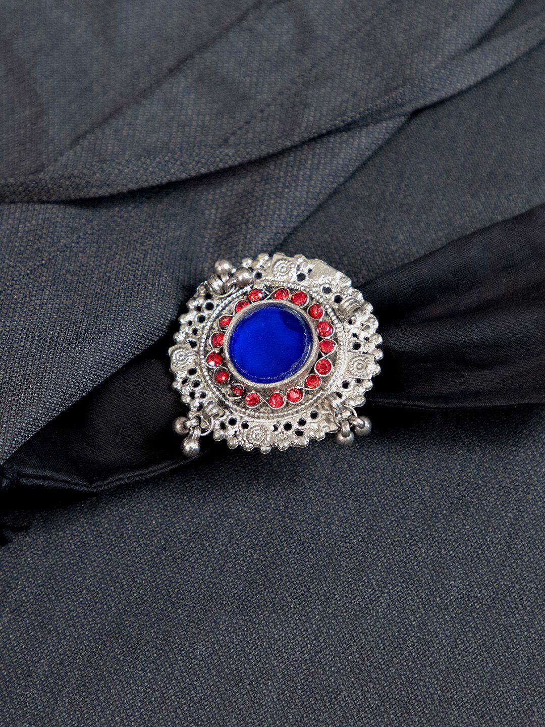 creyons by mansi Silver-Toned, Blue & Red Oversized Afghani Carved Adjustable Handcrafted Finger Ring Price in India