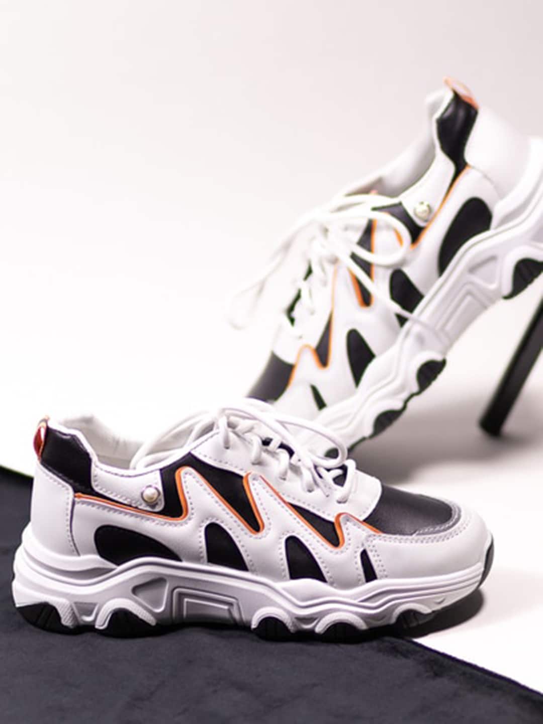 THE WHITE POLE Women White & Orange Woven Design Patent Leather Sneakers Price in India