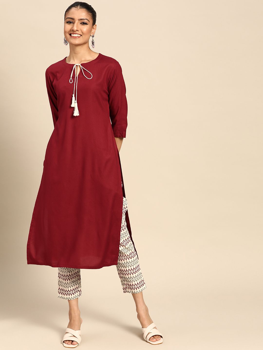 GERUA Women Rust Red Solid Kurta with Trousers Price in India