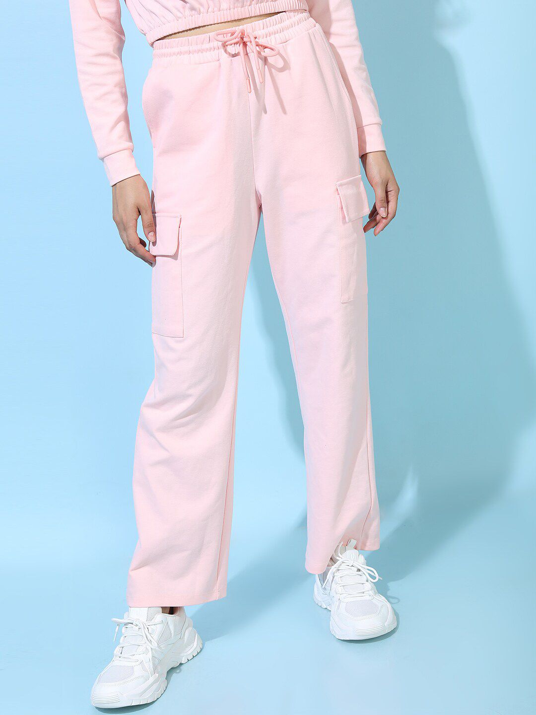 Tokyo Talkies Women Pink Solid Flared Fit Trousers Price in India