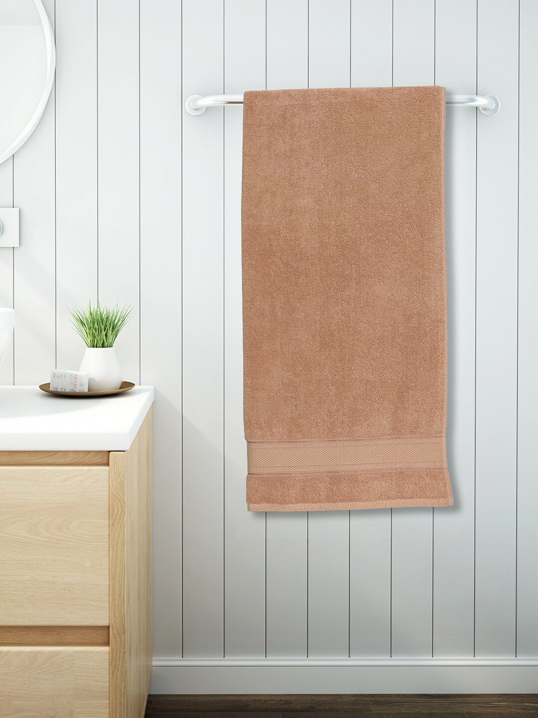 SPACES Peach Solid Bath Towel Price in India