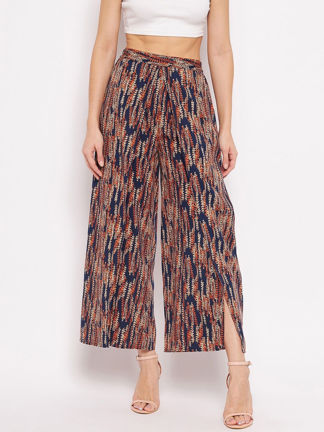 PURYS Women Navy Blue Printed Relaxed Flared Pleated Trousers Price in India