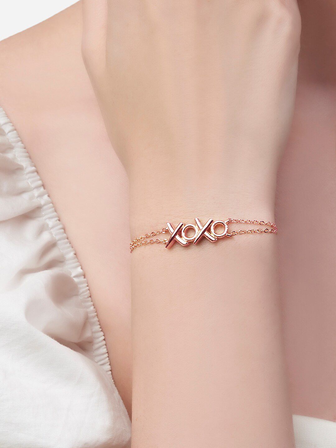 MINUTIAE Women Brass & Rose Gold-Plated Xoxo Charm Bracelet Price in India