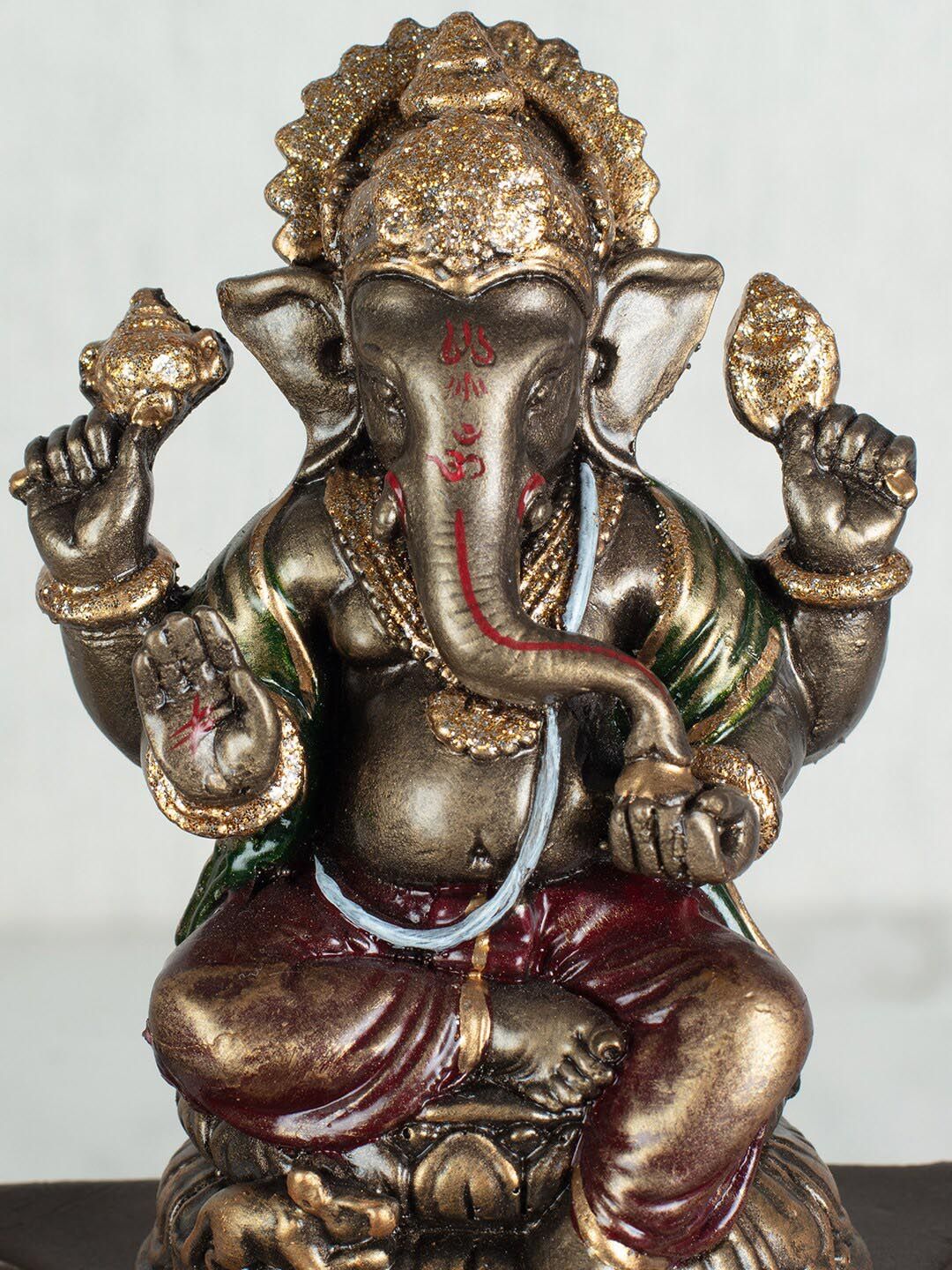 HomeTown Bronze Polyresin Embellished Dynast Ganesha Hand Finished Figurine Price in India