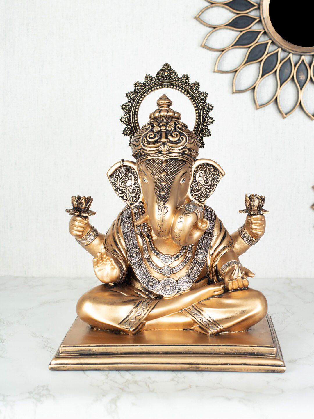 HomeTown Gold-Toned Dynast Polyresin Embellished Ganesha Hand Finished Showpiece Price in India
